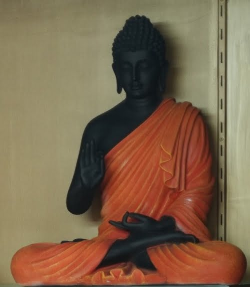 Enhance your home and garden with this graceful vintage reproduction of a Buddha statue, symbolizing peace and harmony. The statue is in a meditating lotus pose, showcasing a unique quality of Buddha.